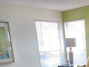 Rest your head in an inviting, spacious bedroom suite at Lake in the Woods, Florida